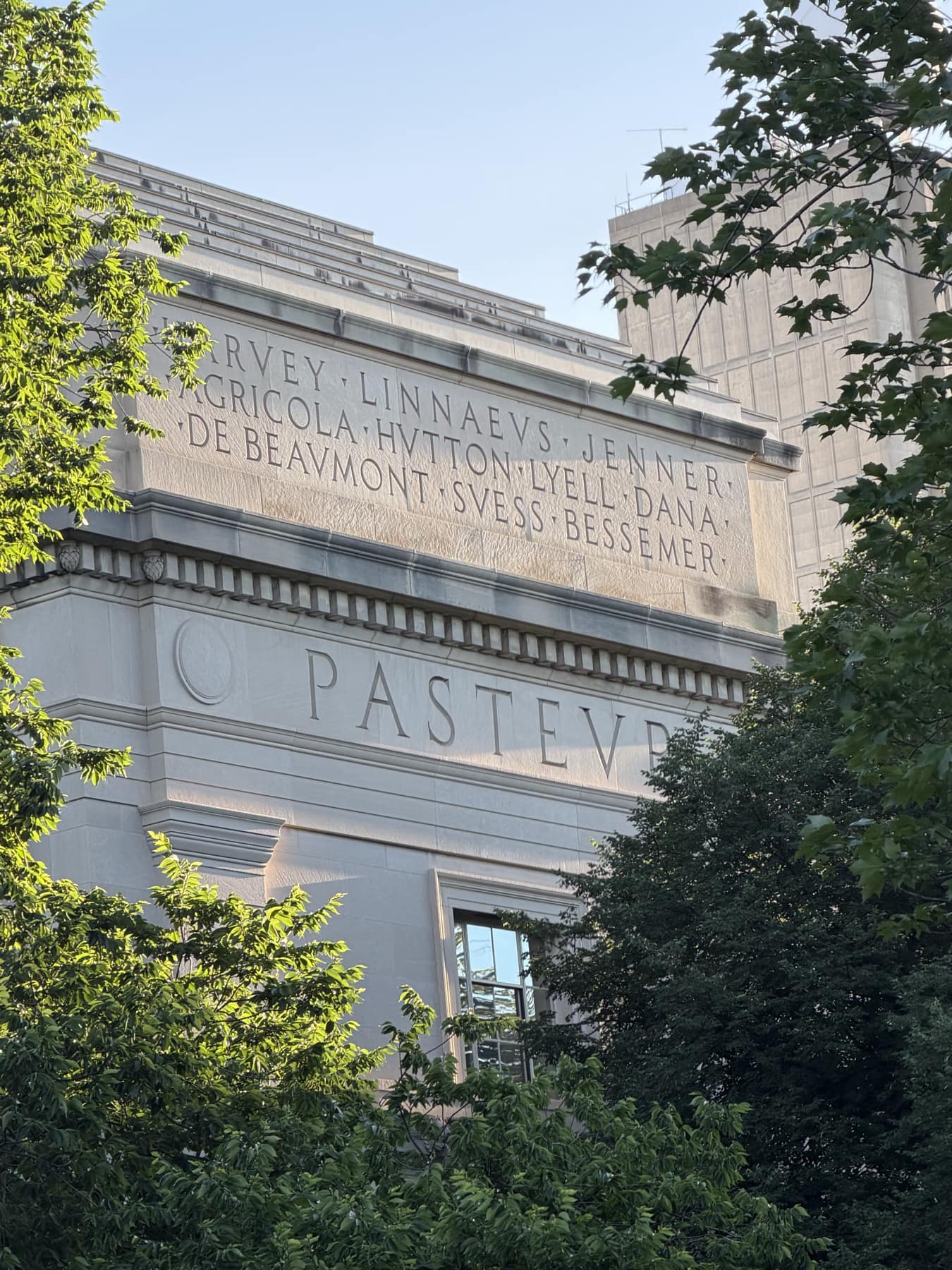 Frieze at MIT with the names Pasteur, Linnaeus, Jenner