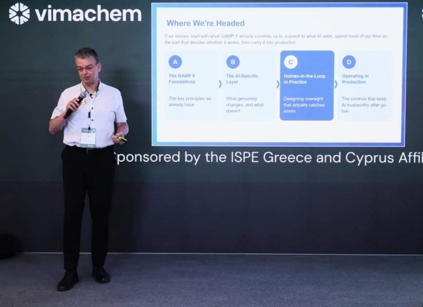 Frank Henrichmann of QFINITY on stage at the Vimachem Pharma Digitization and AI Conference in Athens with the slide Where We're Headed